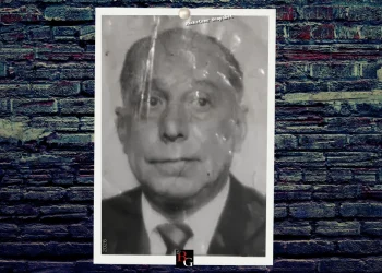 A mugshot of mobster Eugene Giannone featuring a pinned photograph on a brick background with the BG logo at the bottom.
