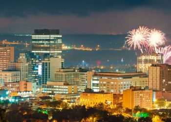 A photo of fireworks exploding in the sky over Hamilton, Ontario.