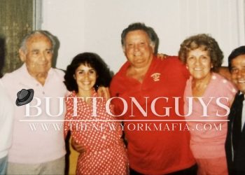 A family photo featuring Jojo Pecora in red and Lou Volpe in white.