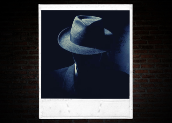 There is no photo of Jimmy Bivona. This is a picture in a mugshot frame of an anonymous man with his face hidden. He is wearing a black fedora and dark blue suit.