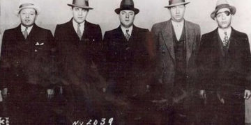 A photo of various Jewish mobsters lined up for a police photo.