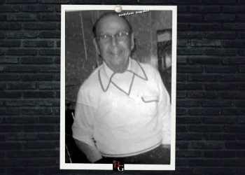 A family photo of mobster Michael Fiermonti featuring a pinned photograph on a brick background with the BG logo at the bottom.