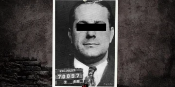 A mugshot of Larry Baccala's father Frank Abbandando Sr. set on a customized BG background with a black rectangle over his eyes and the words "Frank Sr." at the bottom.