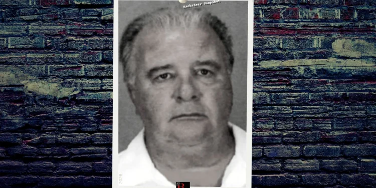 A mugshot of Frank Campione set on a signature BG brick background.