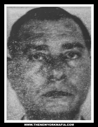A mugshot of Canadian mobster Vic Cotroni set on a signature Button Guys background frame with the words: "www.thenewyorkmafia.com".